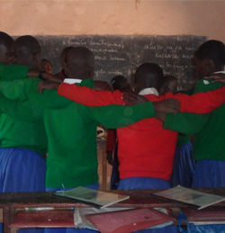LMIC schoolchildren in uniform giving each other accolades