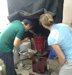 Researchers looking under a curtain