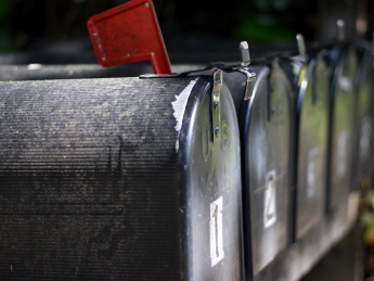Close up of aligned mailboxes 