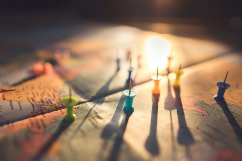 pins on a horizontally placed map