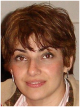 A photo of the young woman with brown short hair.