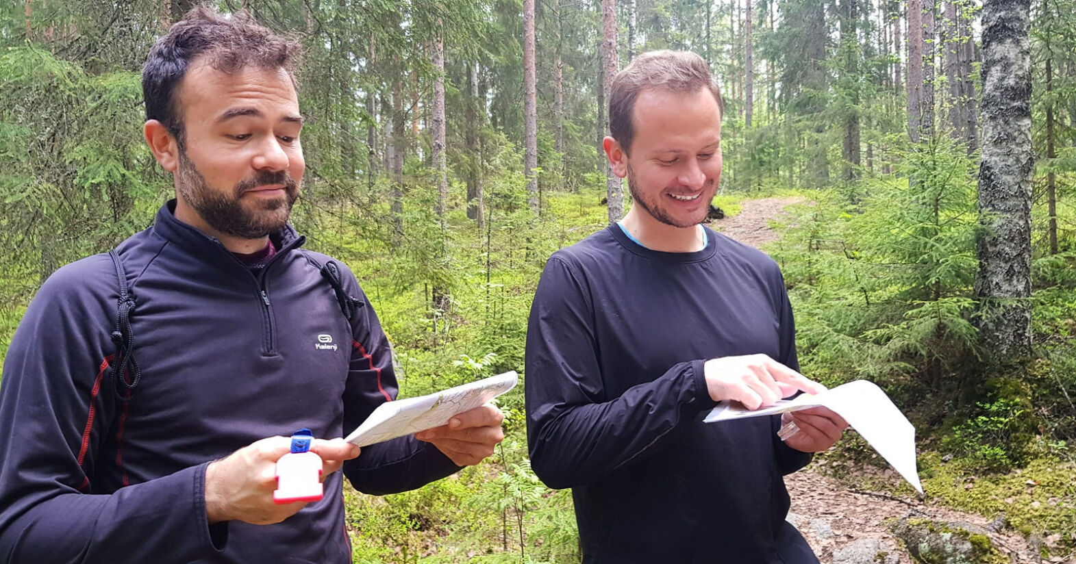 2 individuals orienteering in Finland