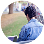 Student on campus using laptop
