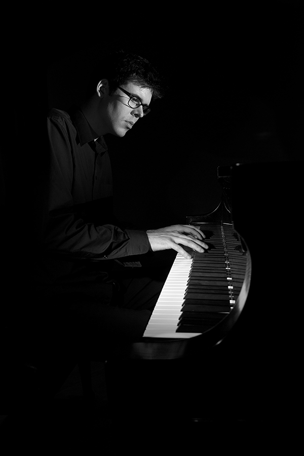 Chris Goddard playing piano