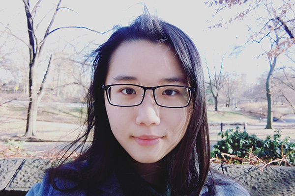 Headshot of Alison Jiang, outside.