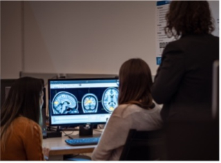students observing brain image on a monitor
