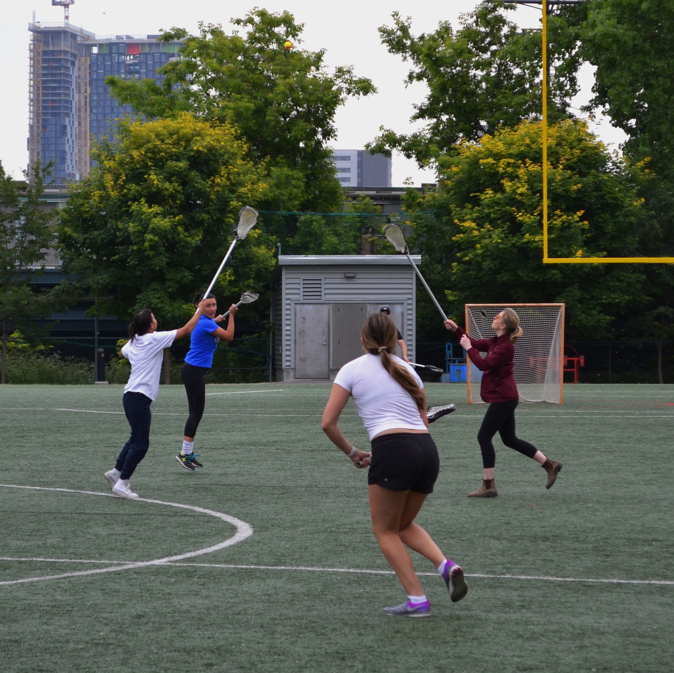 Students playing lacrosse at McGill