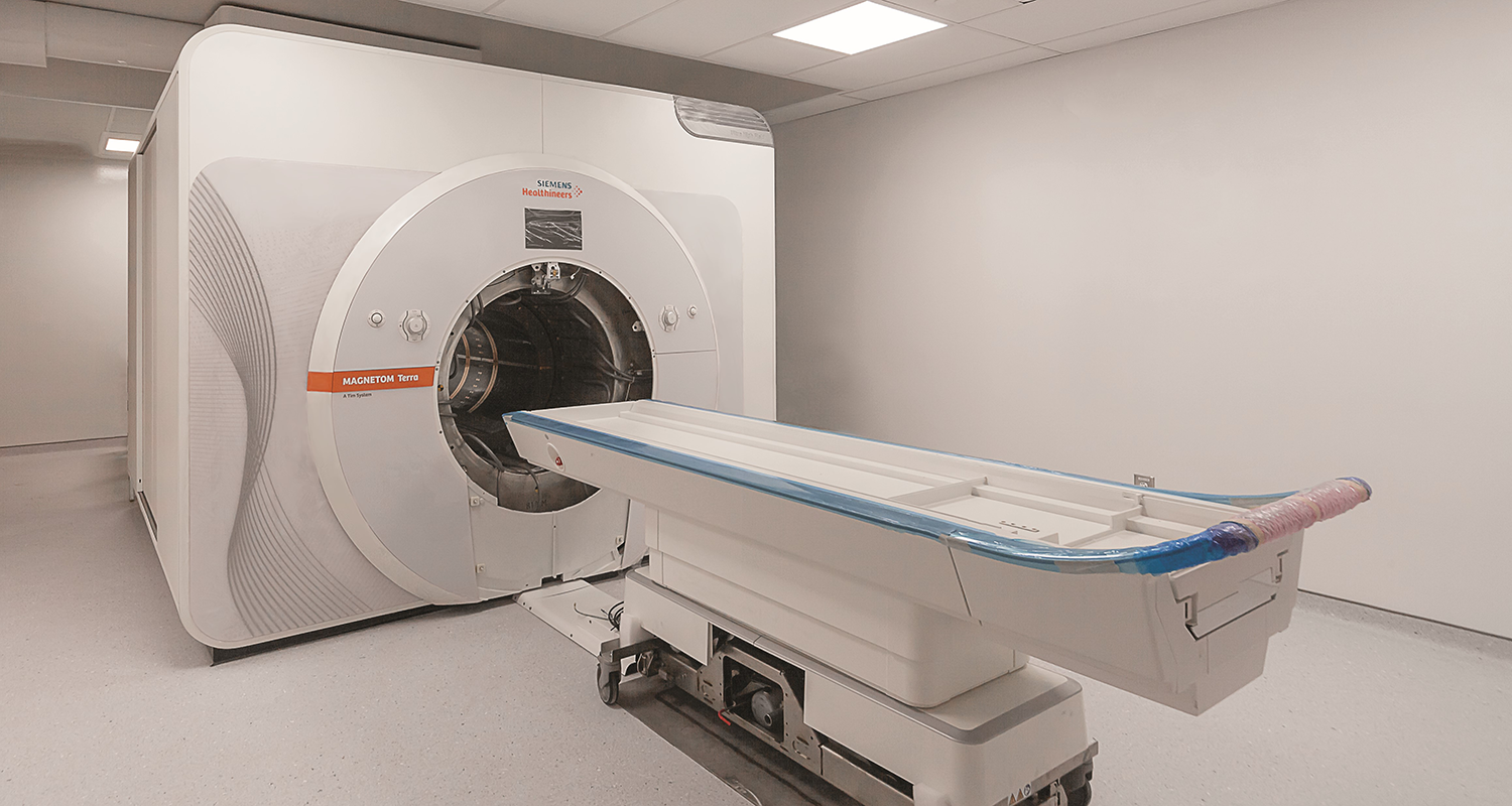 The Neuro's 7T MRI machine, open in a well-lit white room.