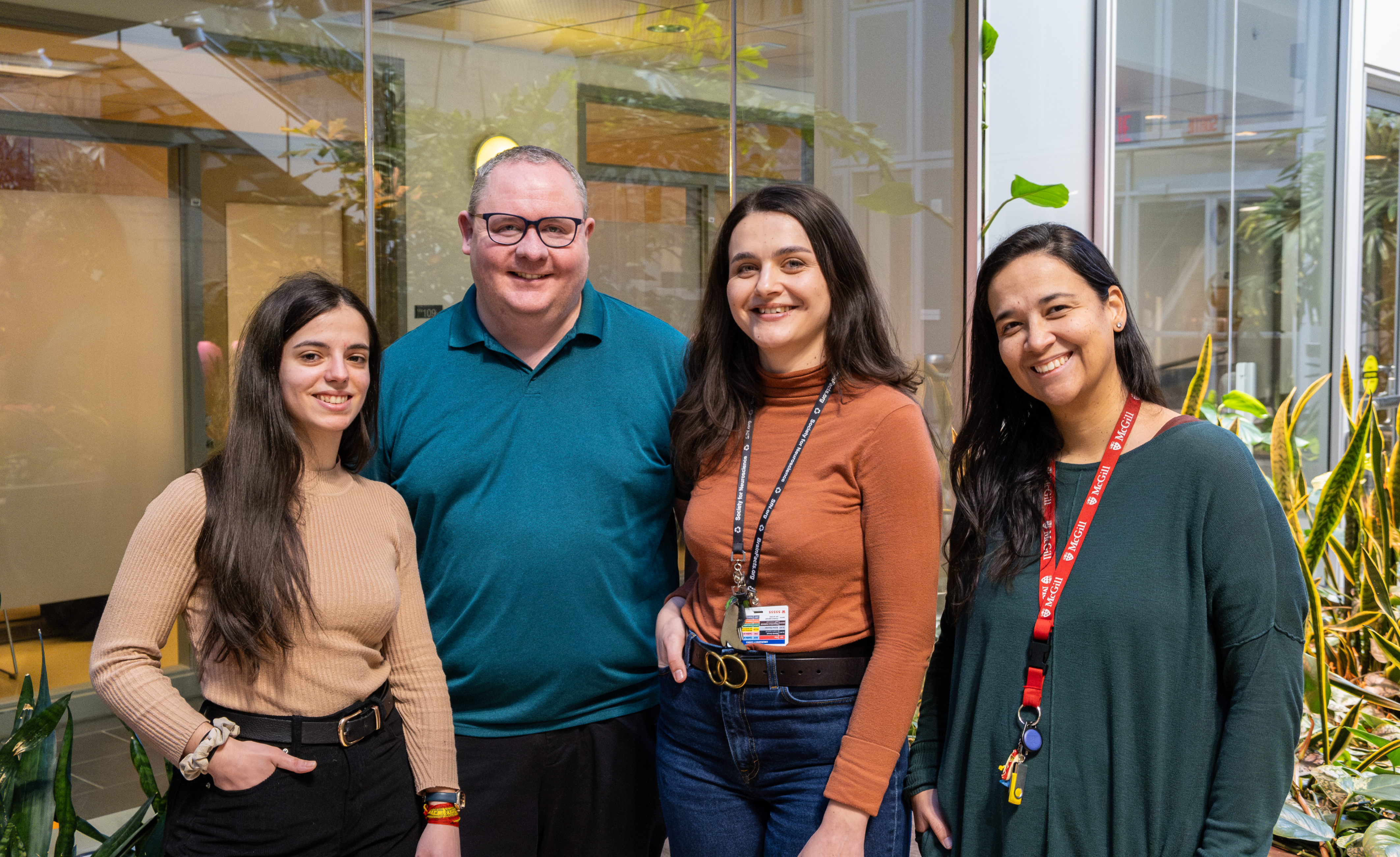 Three women and a man posing and smiling. From left to right: Research Assistant María Belén Baeza Trallero, Thomas Durcan, Associate Professor in the Department of Neurology and Neurosurgery at McGill (Project lead), Research Assistant Paula Lépine and Research Associate Cecilia Rocha.