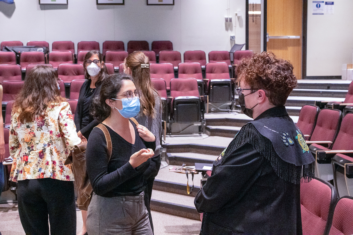 After her conference, Senator Yvonne Boyer chats with an audience member