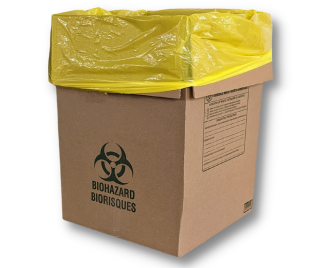 Brown cardboard box with the biohazard logo and lined with a yellow plastic bag