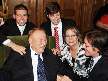 Dr Matte surrounded by proud family members.