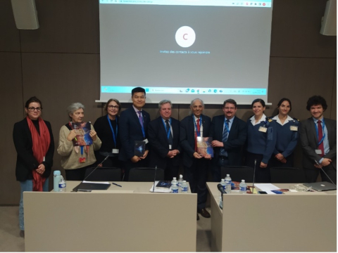 Prof. Ram Jakhu and Mr. Kuan-Wei (David Chen) pose for a picture with delegates of the French Space Command