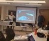 Prof. Beyers and Prof. Boley speak to the class
