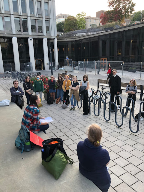 Prof. Alex Ketchum presenting at the pop-up vernissage for the "What's the Recipe for a Queer Cookbook" physical exhibit on October 7th, 2021.