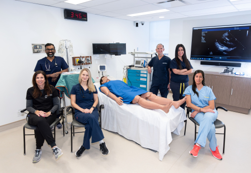 Members of the JGH Emergency Medicine Simulation Program in their simulation room