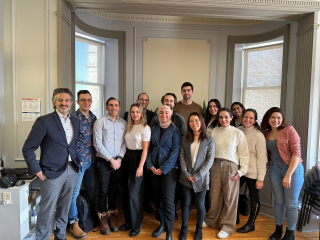 Group shot of Foundations Electives students in Room 100 at Lady Meredith House, December 2023