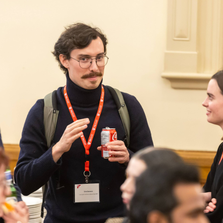 three people talking in a networking setting