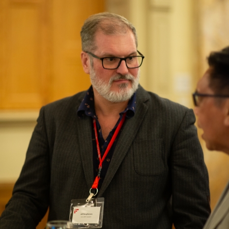Two men in conversation