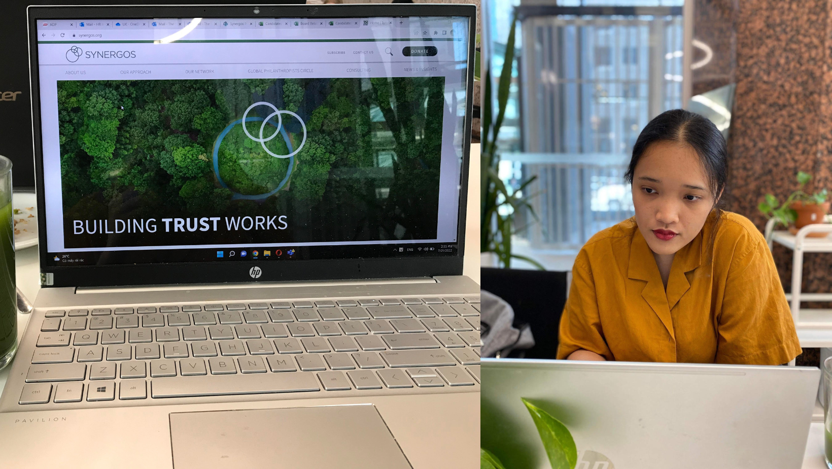 On the left, Thu's computer showing the Synergos page, on the right, Thu working on her computer