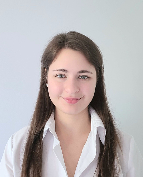 Maryna Nekrasova in front of a white background