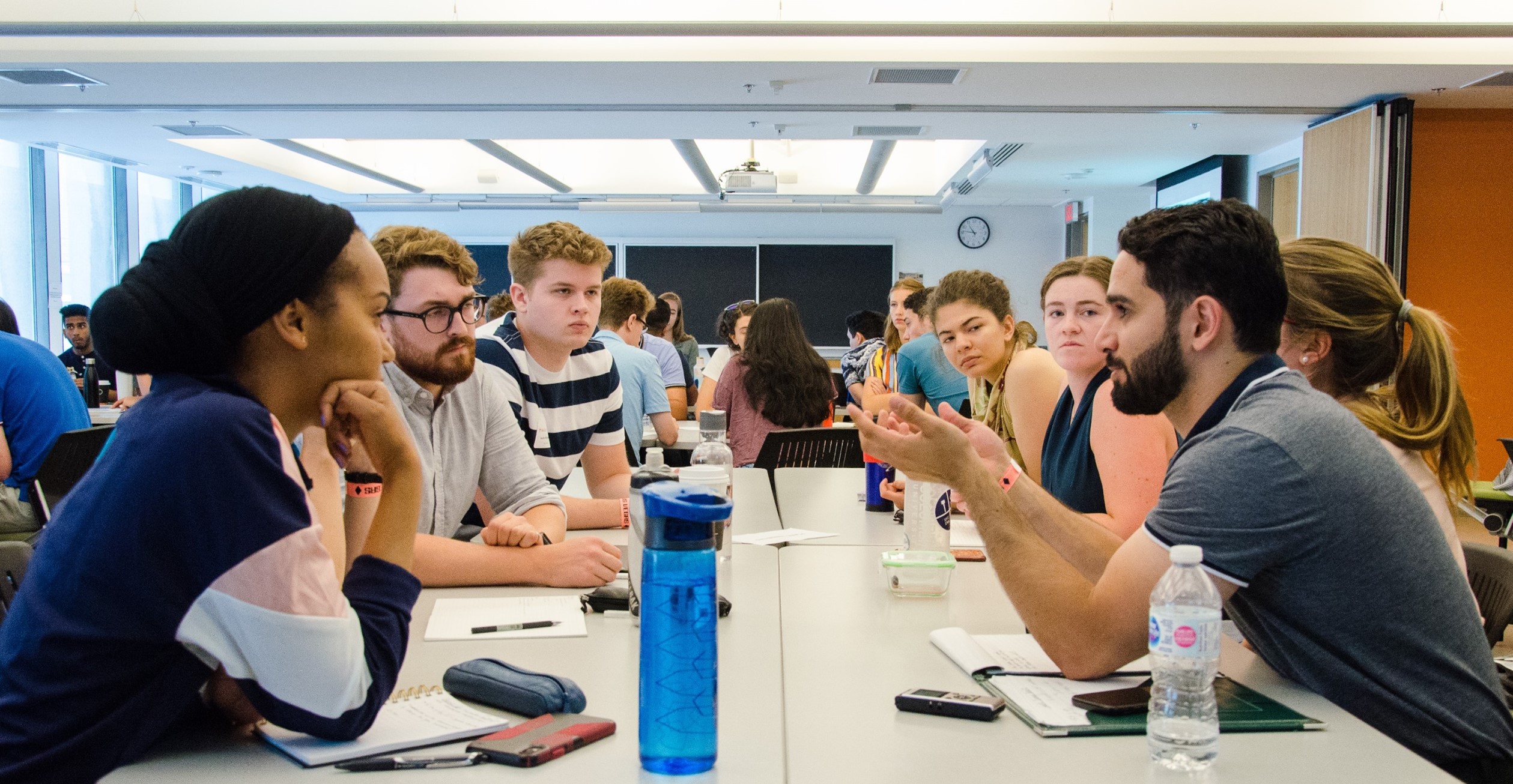 Students sitting at a table discussing