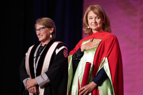 Professor Poirier standing next to McGill Principal Suzanne Fortier