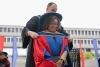Professor Adelle Blackett getting hooded at the SFU Convocation ceremony