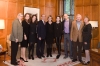 The extended family of Alex Konigsberg in the Dean's office.