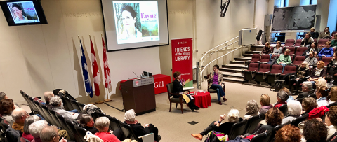 MacLennan Lecture featuring Ann-Marie MacDonald and moderator Erin Hurley in front of audience. 