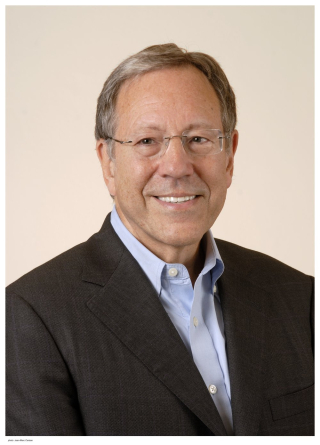 Headshot of Irwin Cotler smiling at the camera.