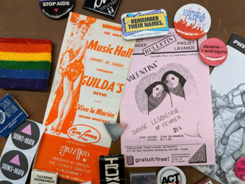 Various pamphlets, pins and paraphernalia relating LGBT+ culture. 