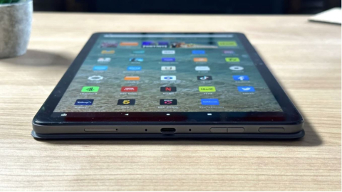 Fire tablet laying flat on a wood table.