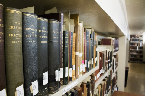 Close-up of books on a bookshelf.