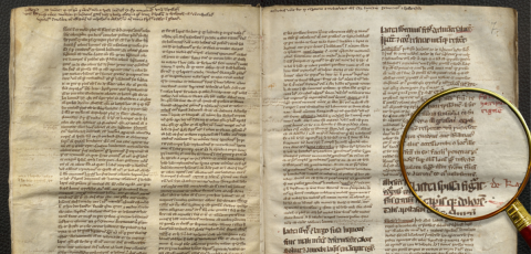 magnifier over a manuscript