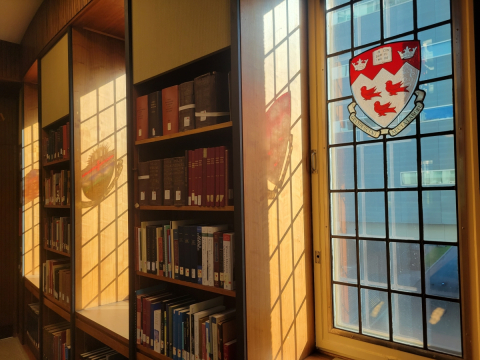Morning sunlight streaming through stained glass windows at the Osler Library of the History of Medicine