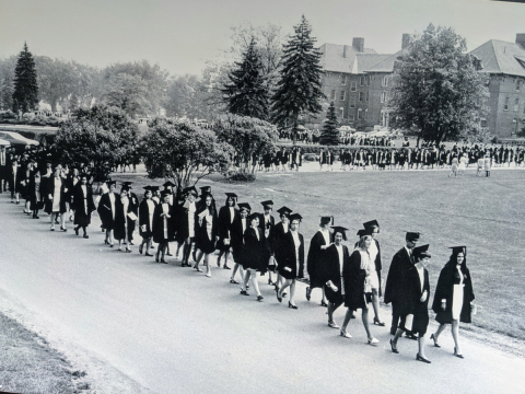 Graduates walking in procession at Macdonald Campus.