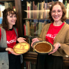 two women holding pies