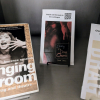 Various materials on drag and theatre culture on display.