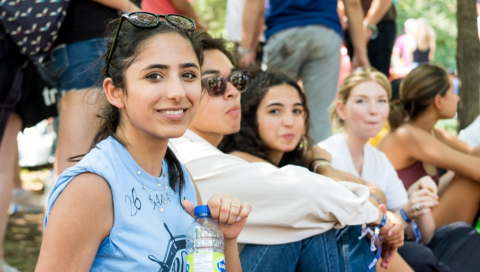 A group of students gathered outside.