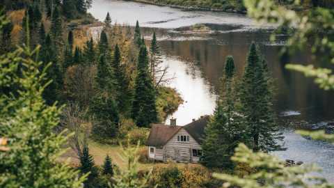 House next to a river in rural Quebec