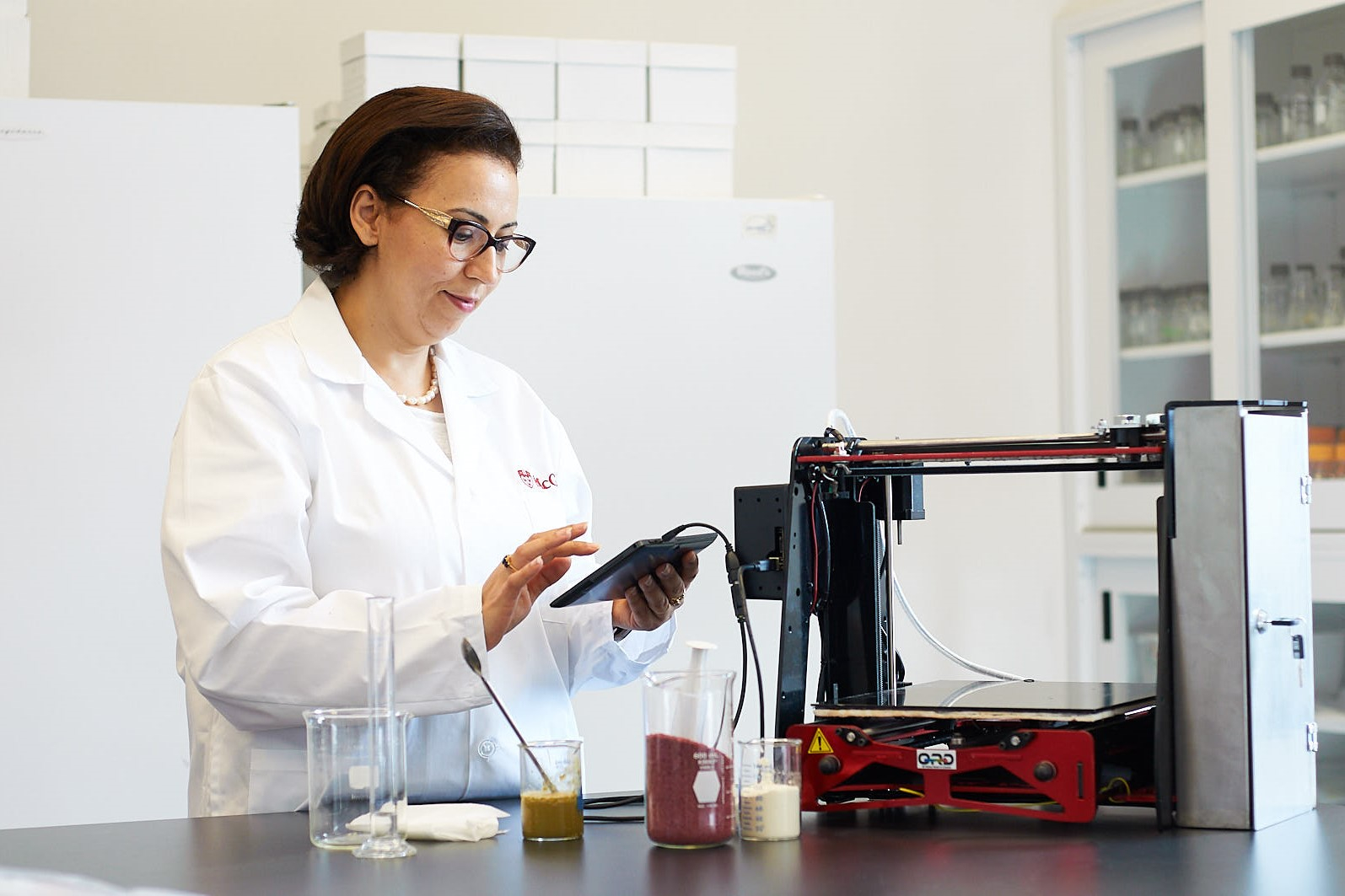 Salwa Karboune using equipment in her food science lab