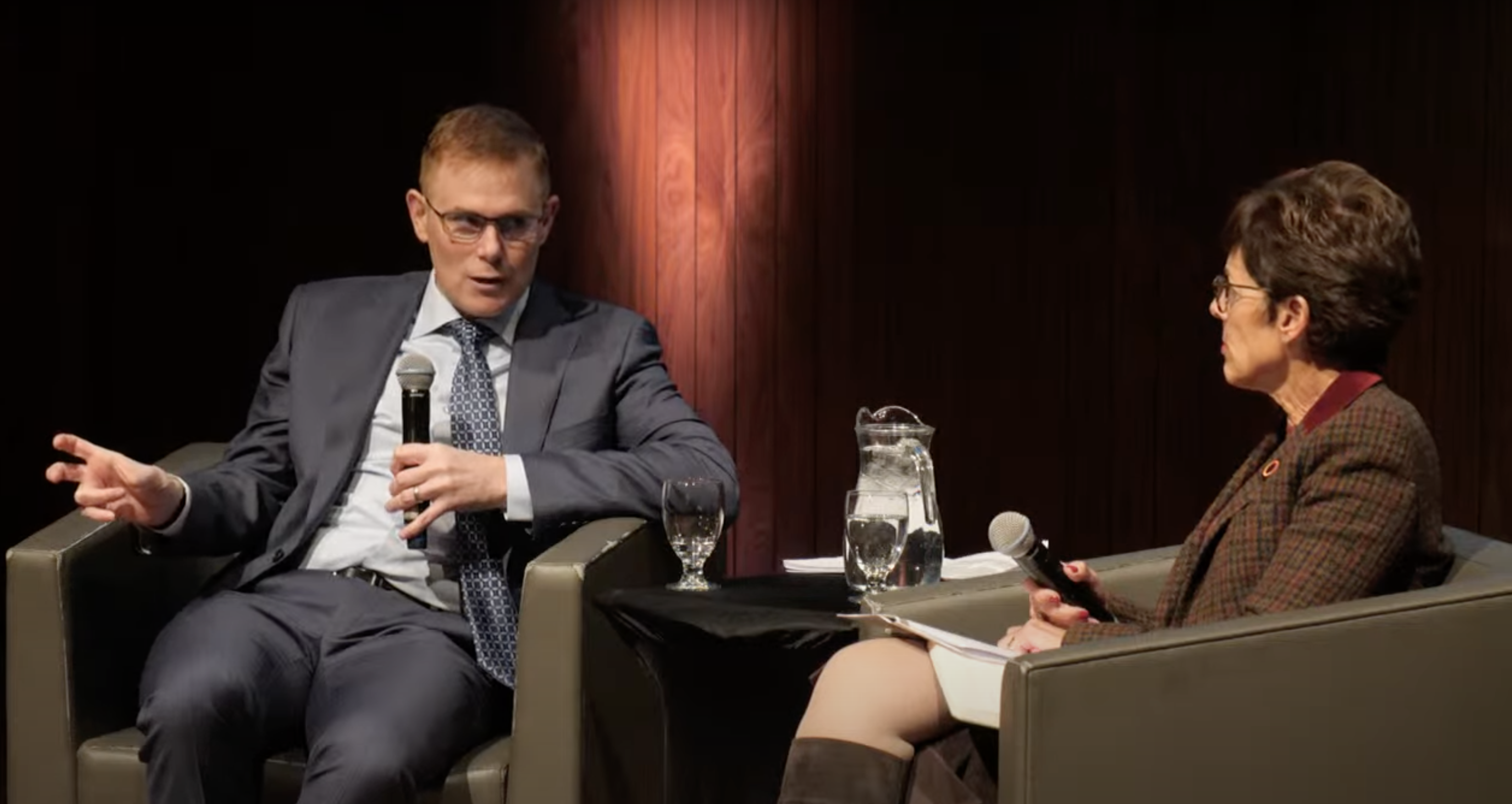 Andrew Leach in conversation with Deborah Yedlin on stage, at Calgary's Studio Bell.