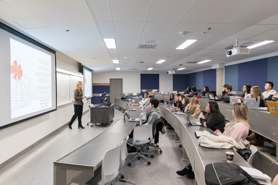 Mary Dellar teaches the Services Marketing course to a BCom class in the brand new 75-seat Tiered Classroom.