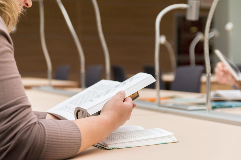 student studying in a library