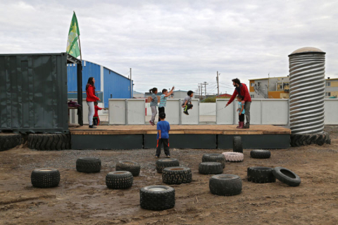 Kids jump rope on the new outdoor stage in Kuujjuaq. Photo by Susane Havelka 