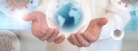 Imagery of globes of viruses and the world globe in our hands