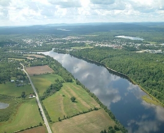 Aerial view of the river going by Maniwaki.