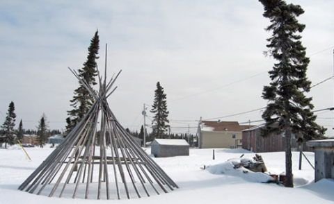 Infrastructure of a tipi in the snow.