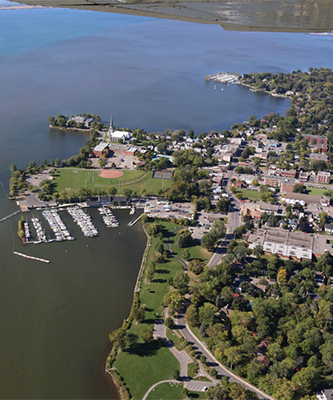 Aerial view of a town near a body of water.